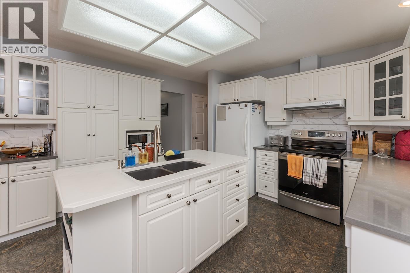 Primary bedroom of 7817 PIEDMONT CRESCENT · Prince George, BC