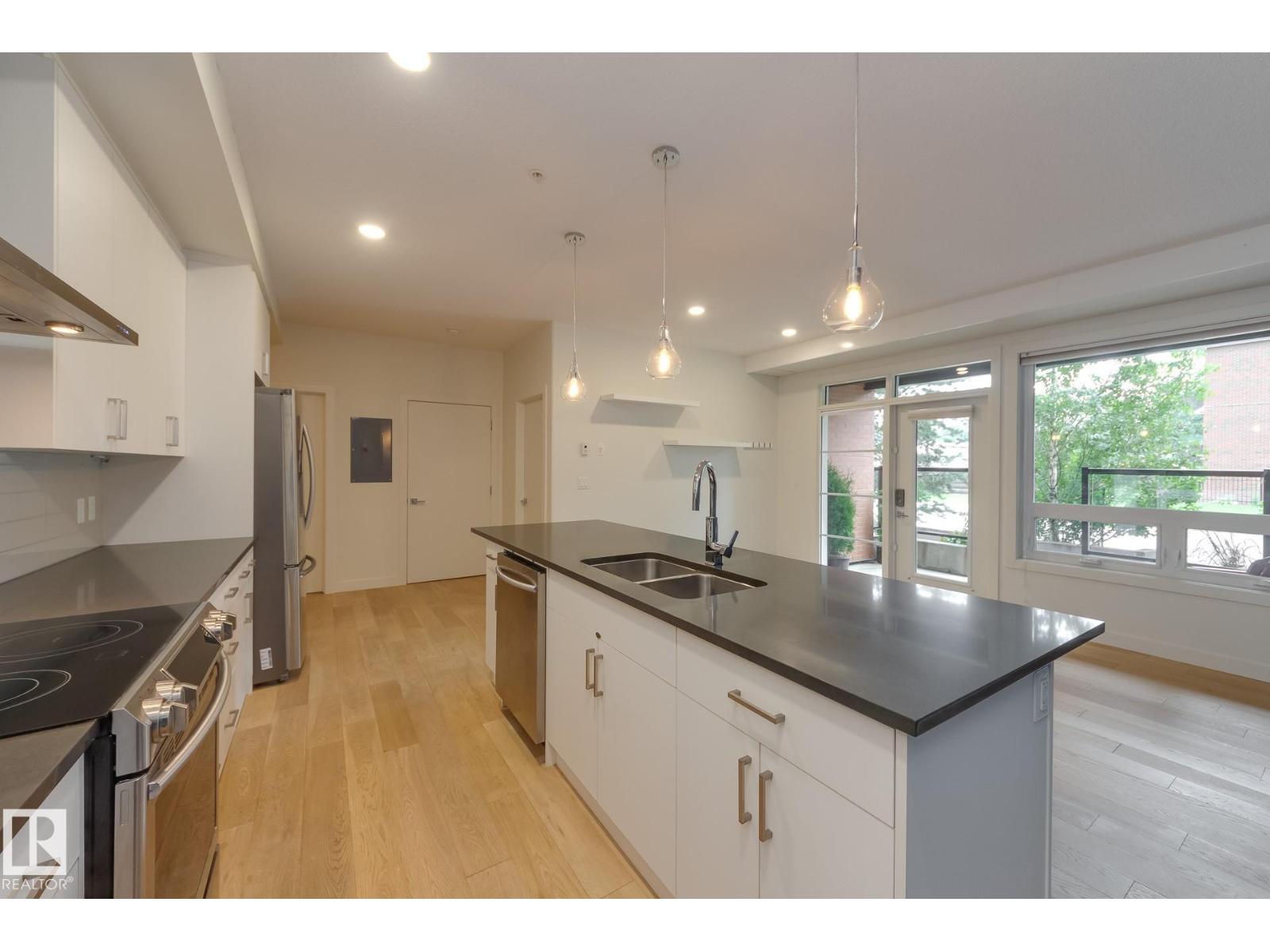 #102 10606 84 AV NW - 11
