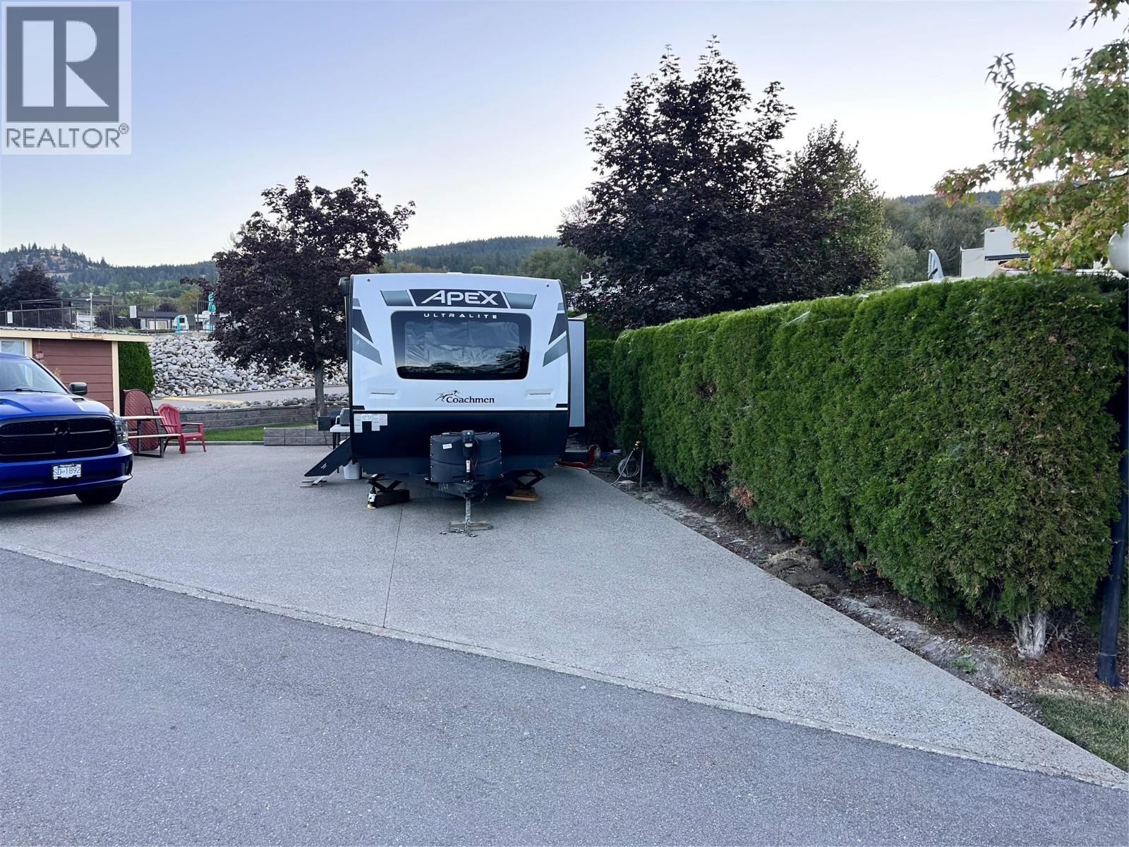 Large entry onto this wide lot with easy access for your RV