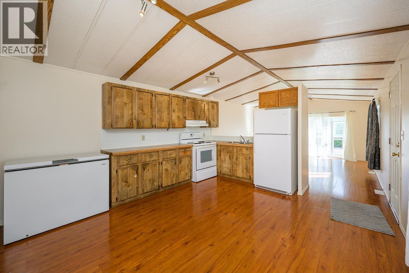 Photo 9 of 27 — 8487 PETER ROAD · Prince George, BC
