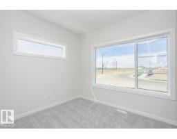 Bedroom 4 - 303 Edgemont Dr Nw, Edmonton, AB T6M3G7 Photo 7