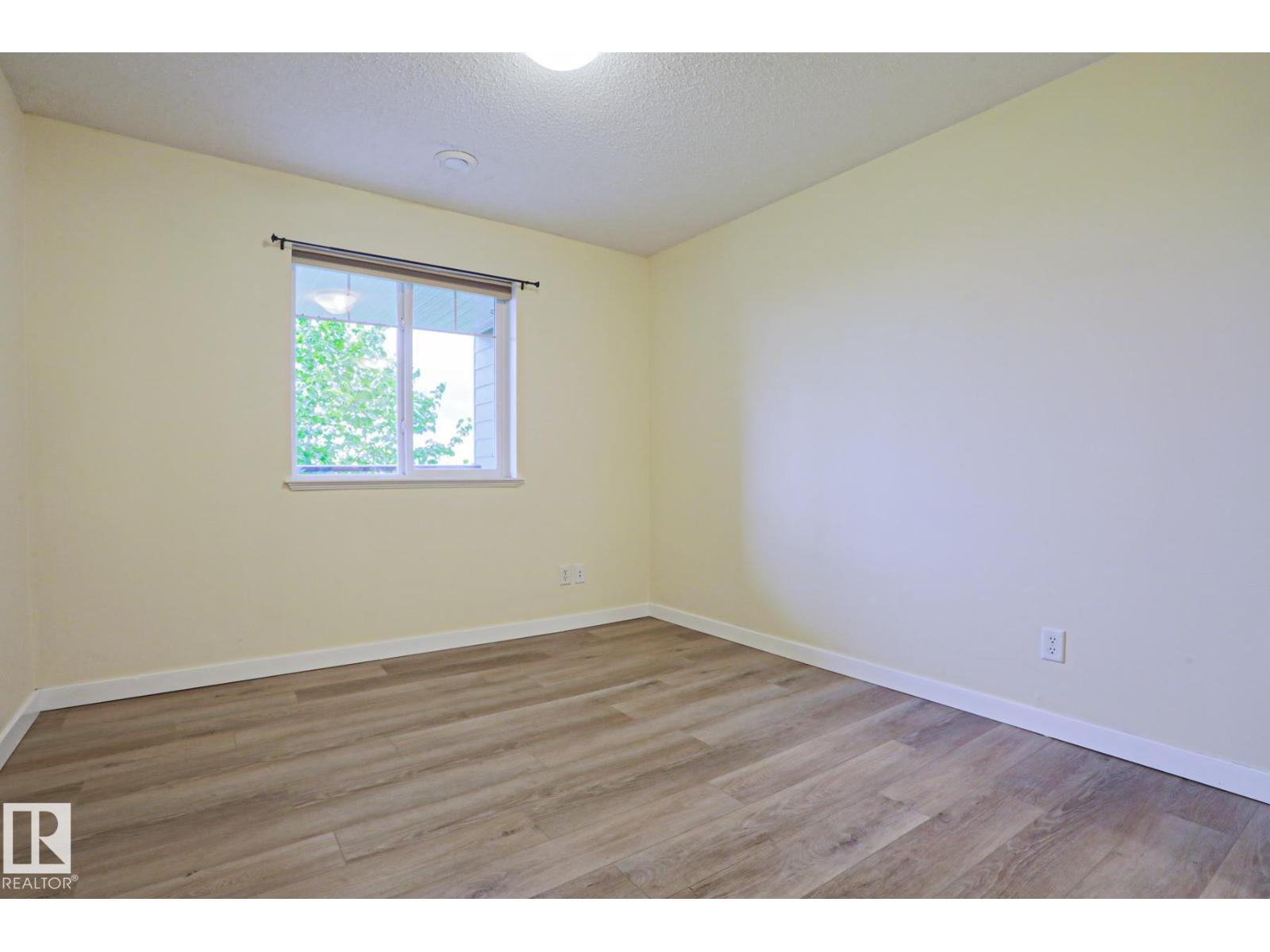 #211 6925 199 ST NW - 18