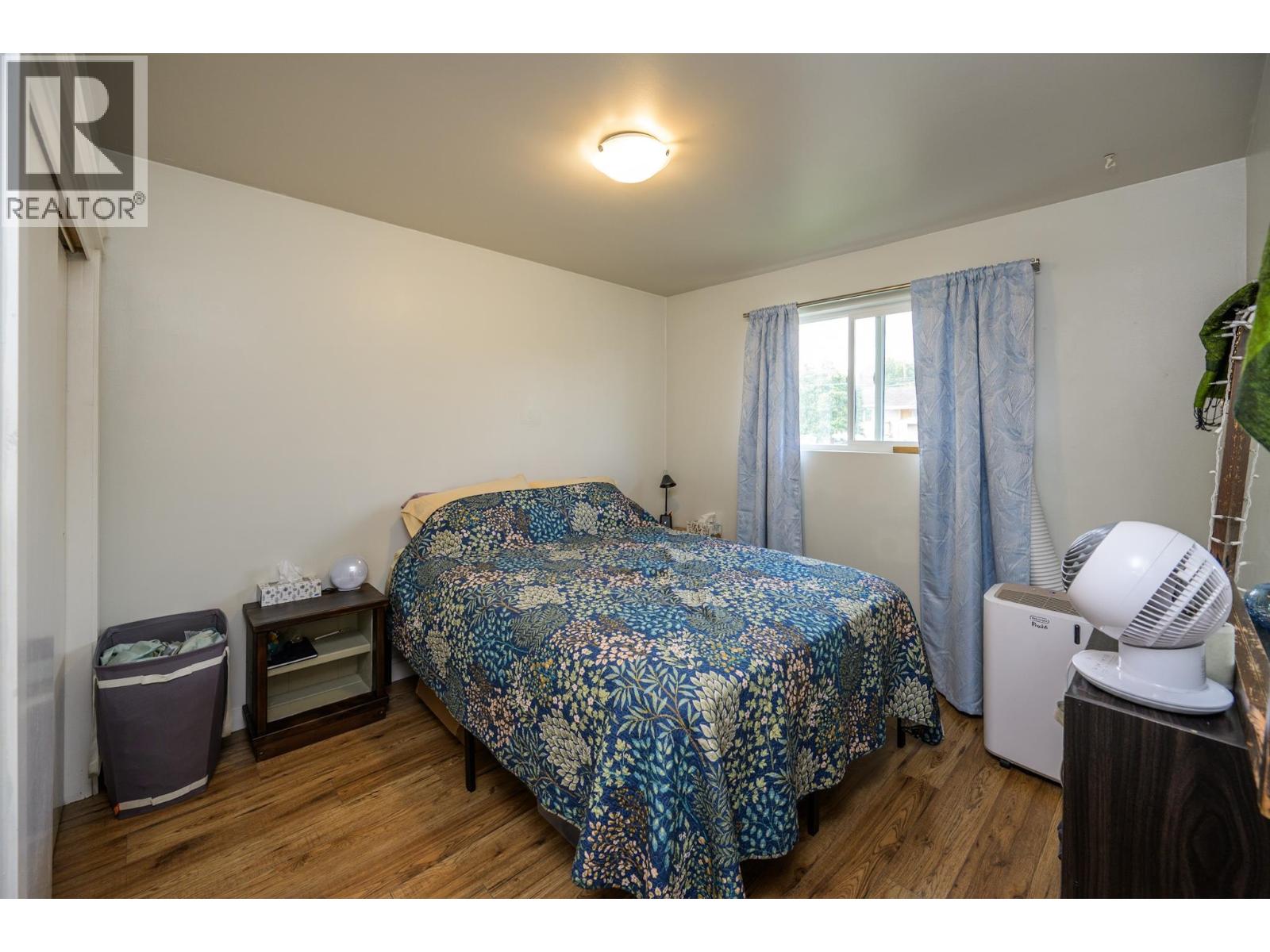 Primary bedroom of 1200-1208 CUDDIE CRESCENT · Prince George, BC