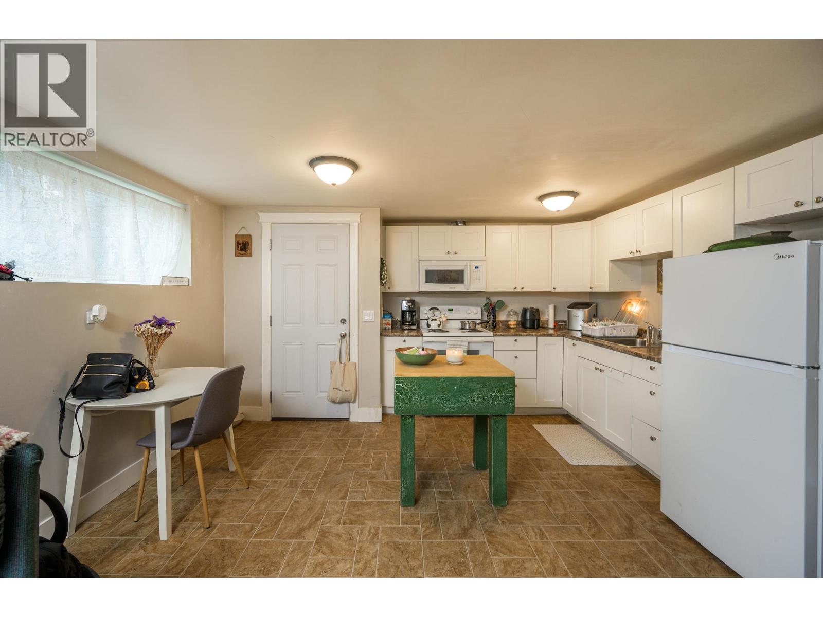 Photo 27 of 37 — 1200-1208 CUDDIE CRESCENT · Prince George, BC