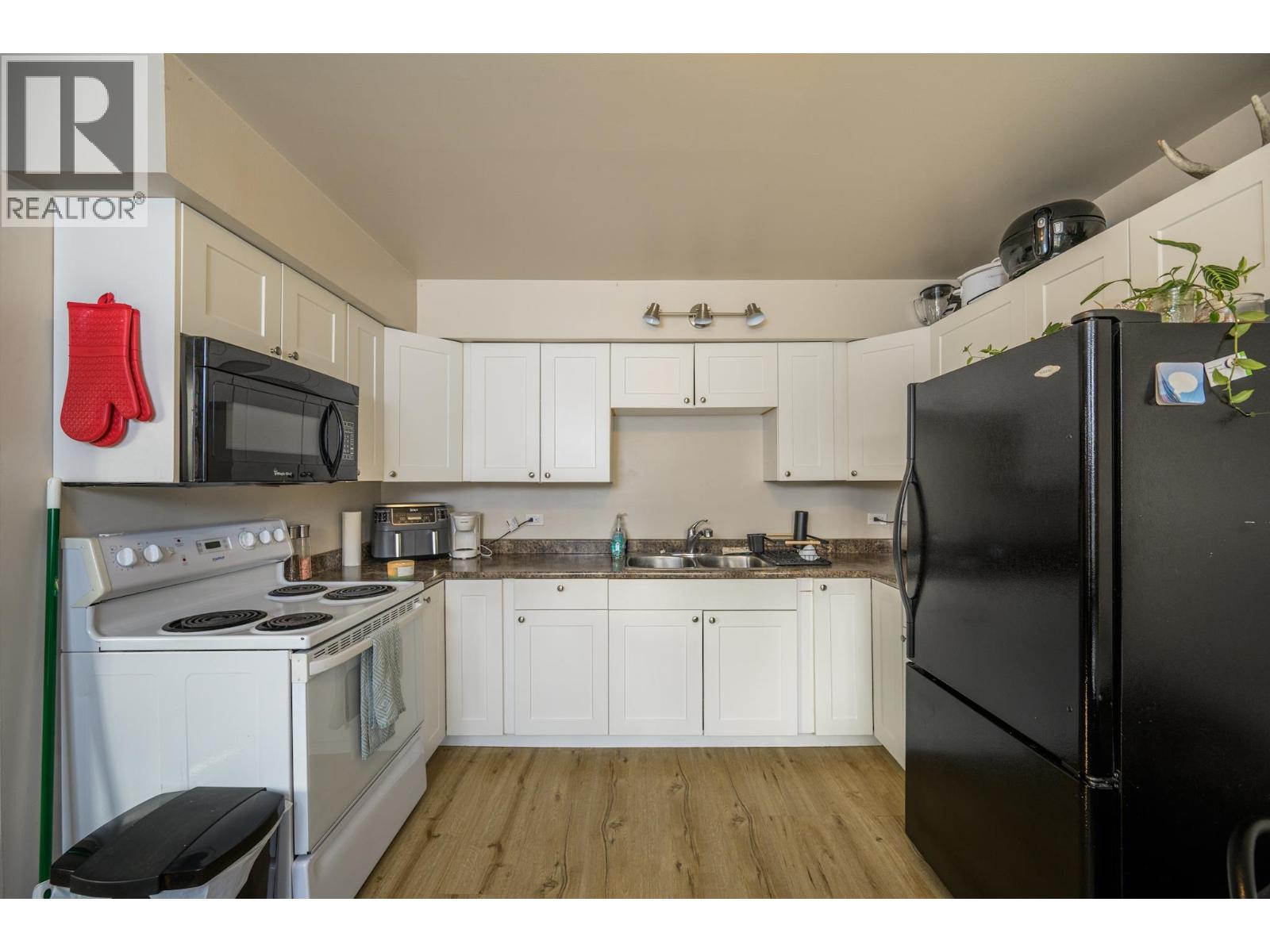 Photo 12 of 37 — 1200-1208 CUDDIE CRESCENT · Prince George, BC
