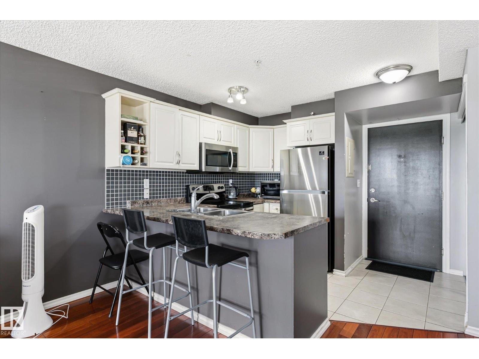 #418 17404 64 AV NW - 10