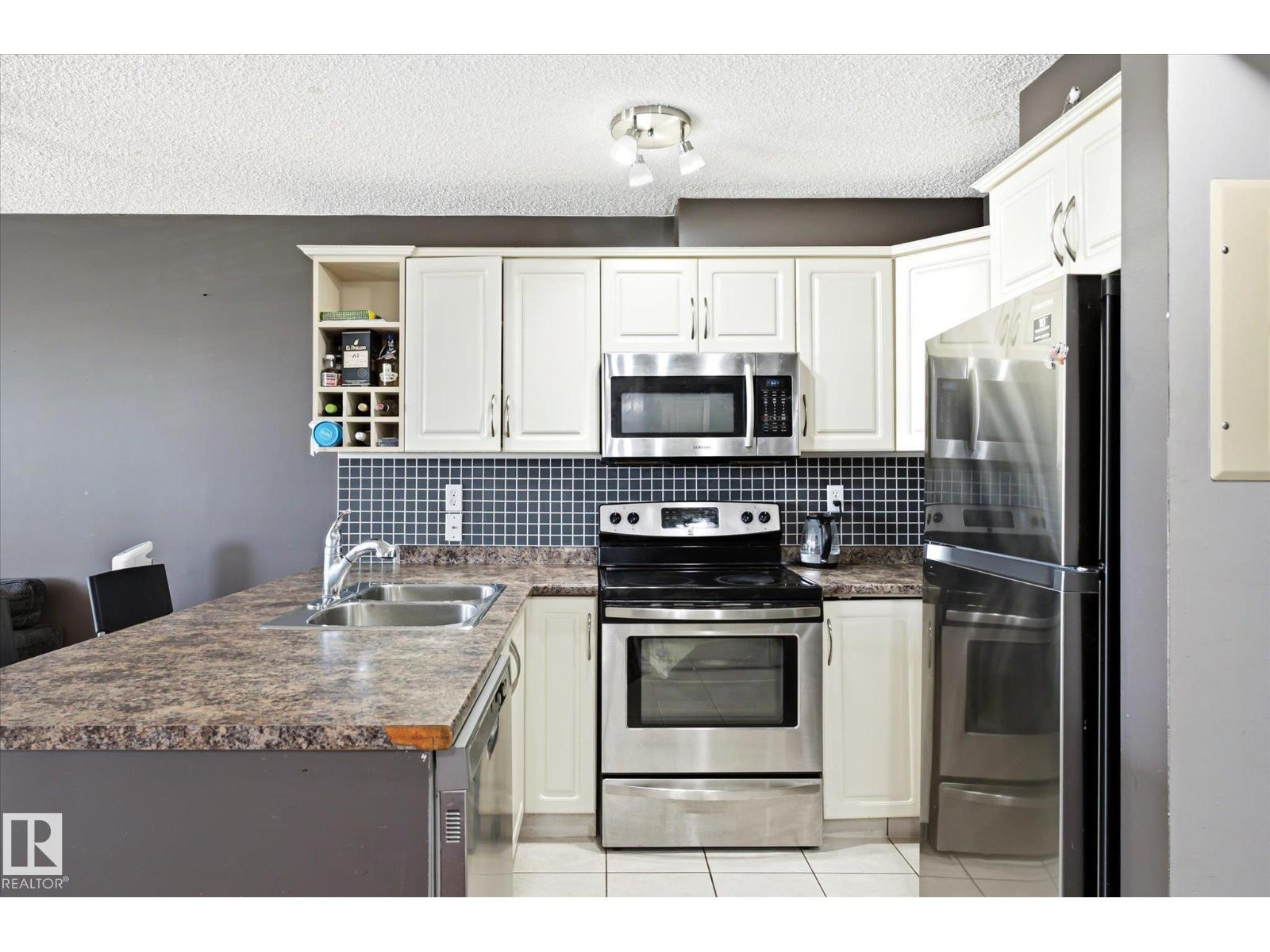 #418 17404 64 AV NW - 8