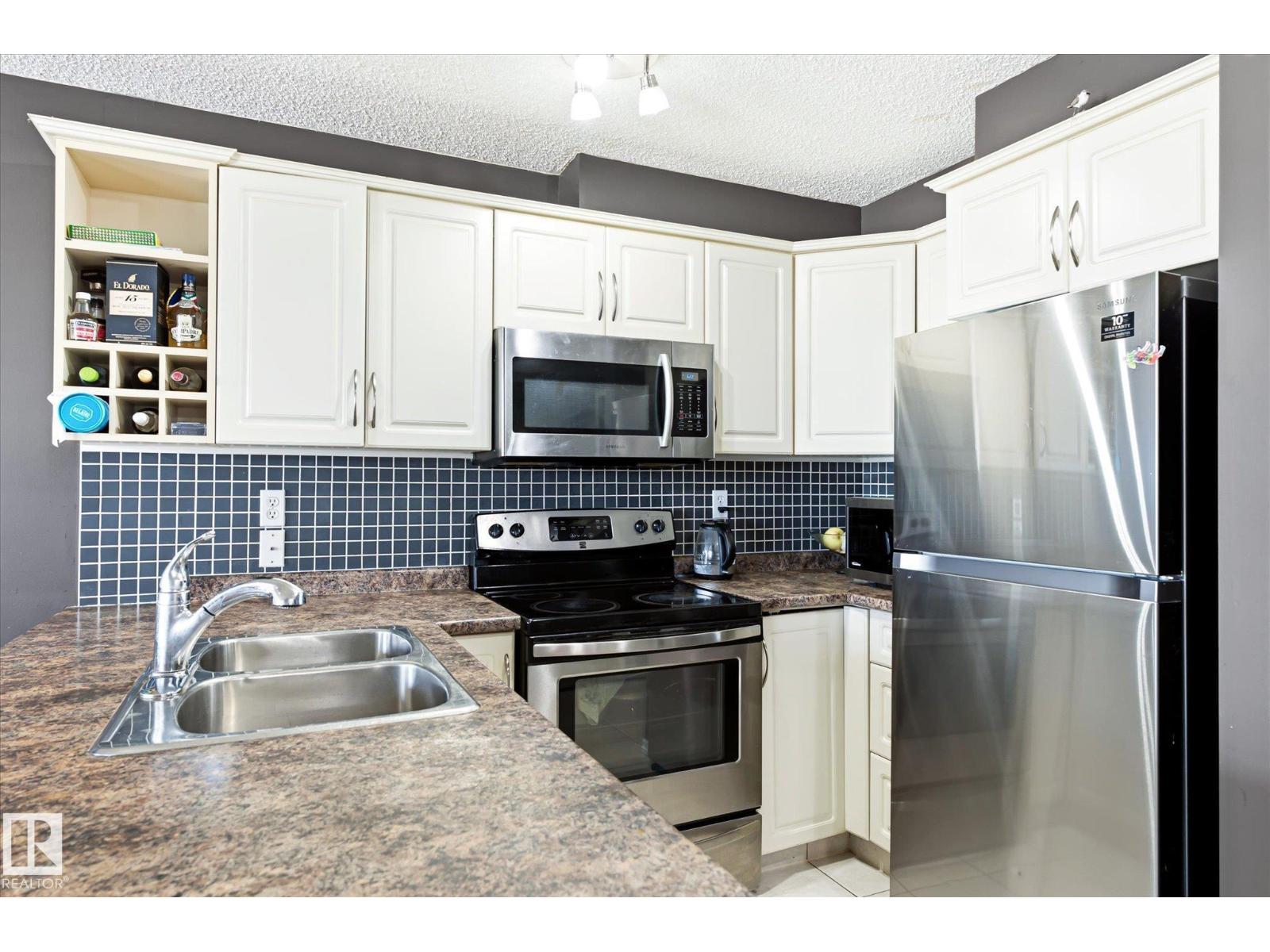 #418 17404 64 AV NW - 9