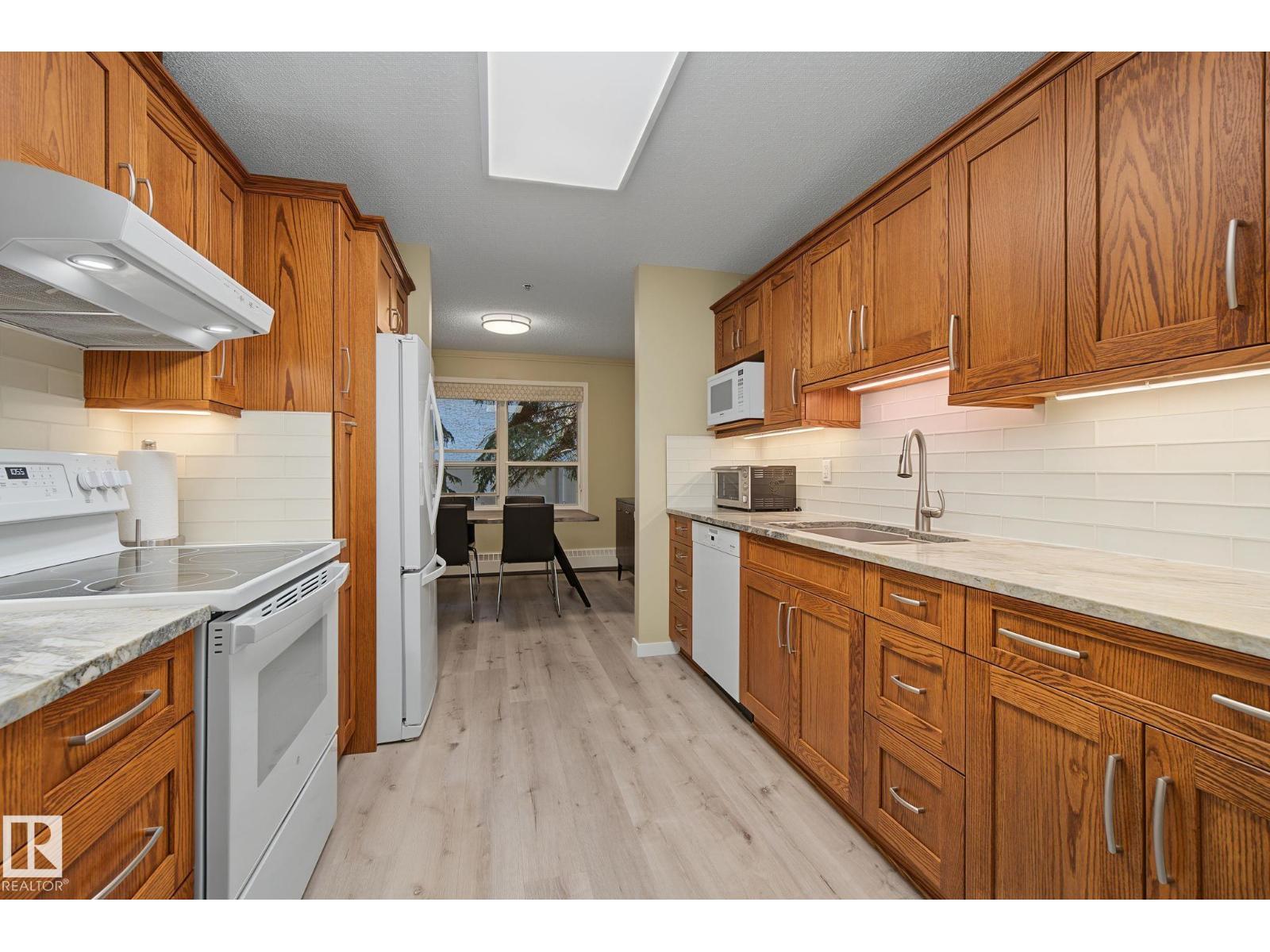 #105 17511 98A AV NW - 18