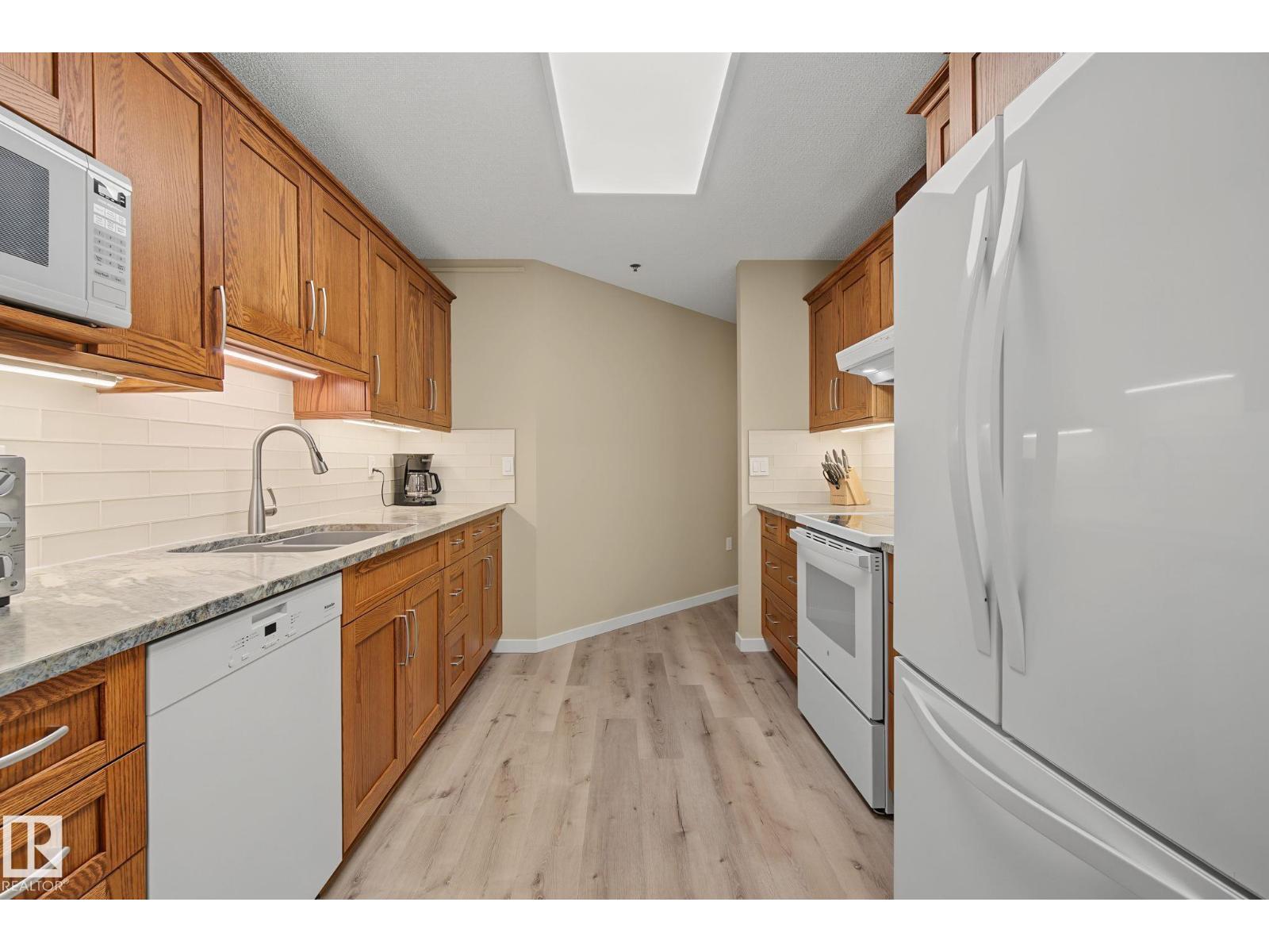 #105 17511 98A AV NW - 21