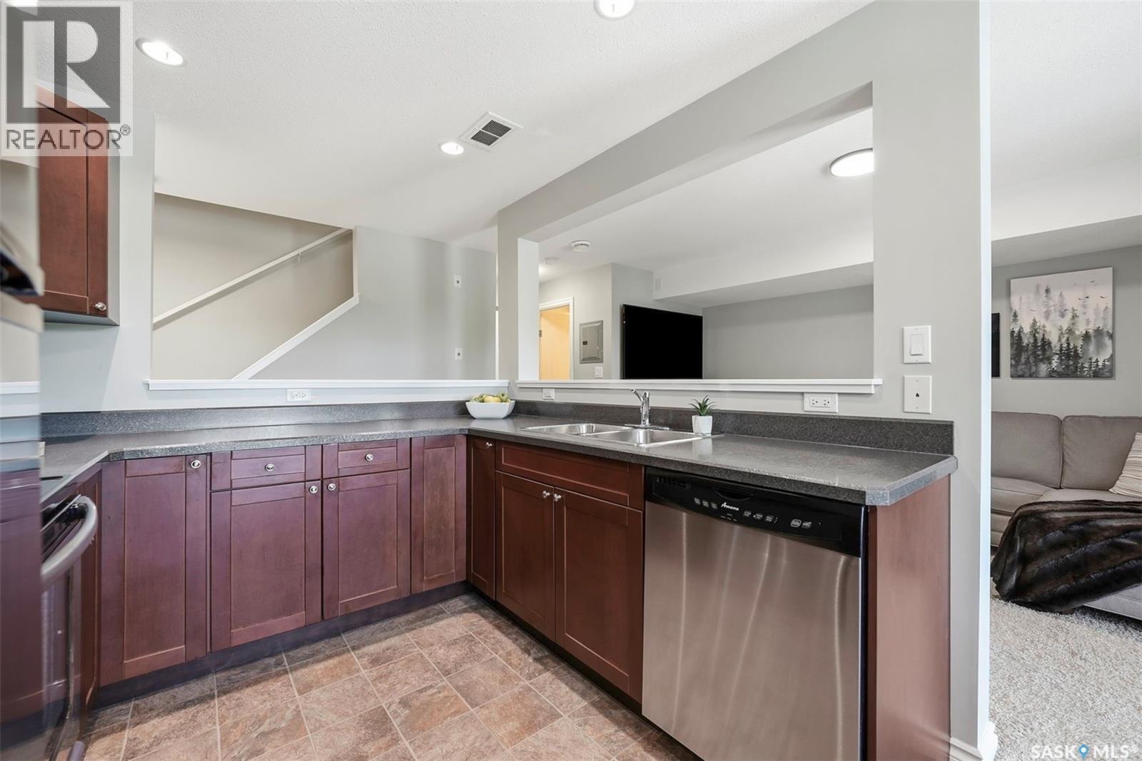 #203 515 28th STREET E - 11