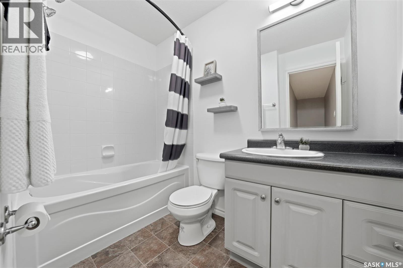 #203 515 28th STREET E - 23
