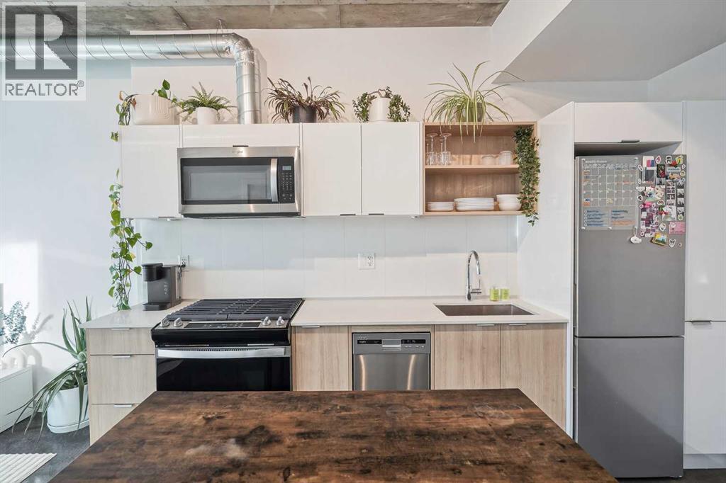 #203 1319 14 Avenue SW - 14