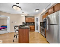 Laundry room - #703 9707 106 St Nw, Edmonton, AB T5K0B7 Photo 6
