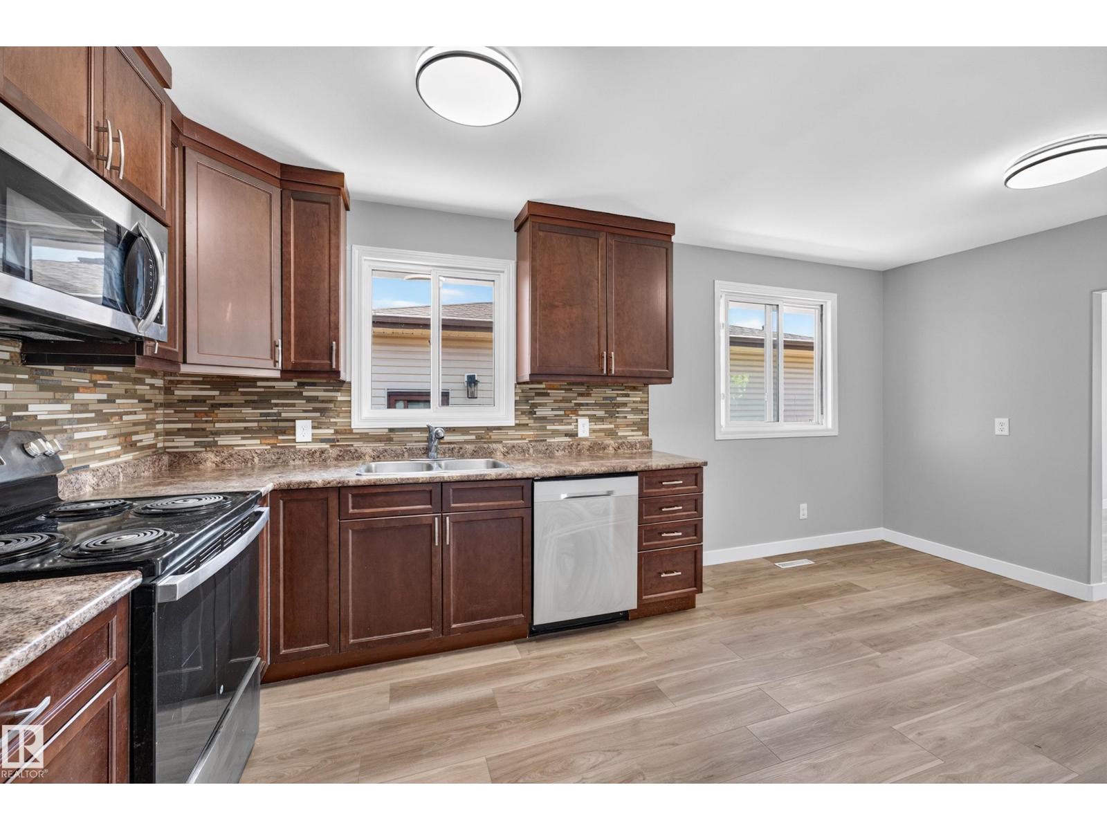 6016 92 AV NW - 9