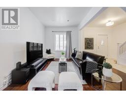 Living room - 107 Twenty Fourth Street, Toronto, ON M8V3N7 Photo 6