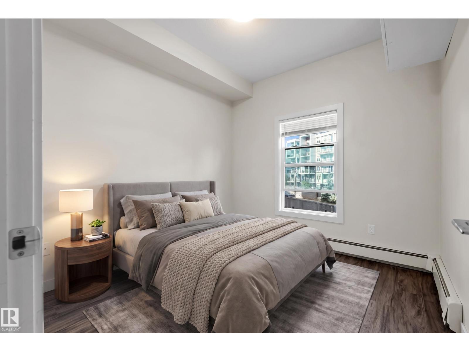 #209 10611 117 ST NW - 12