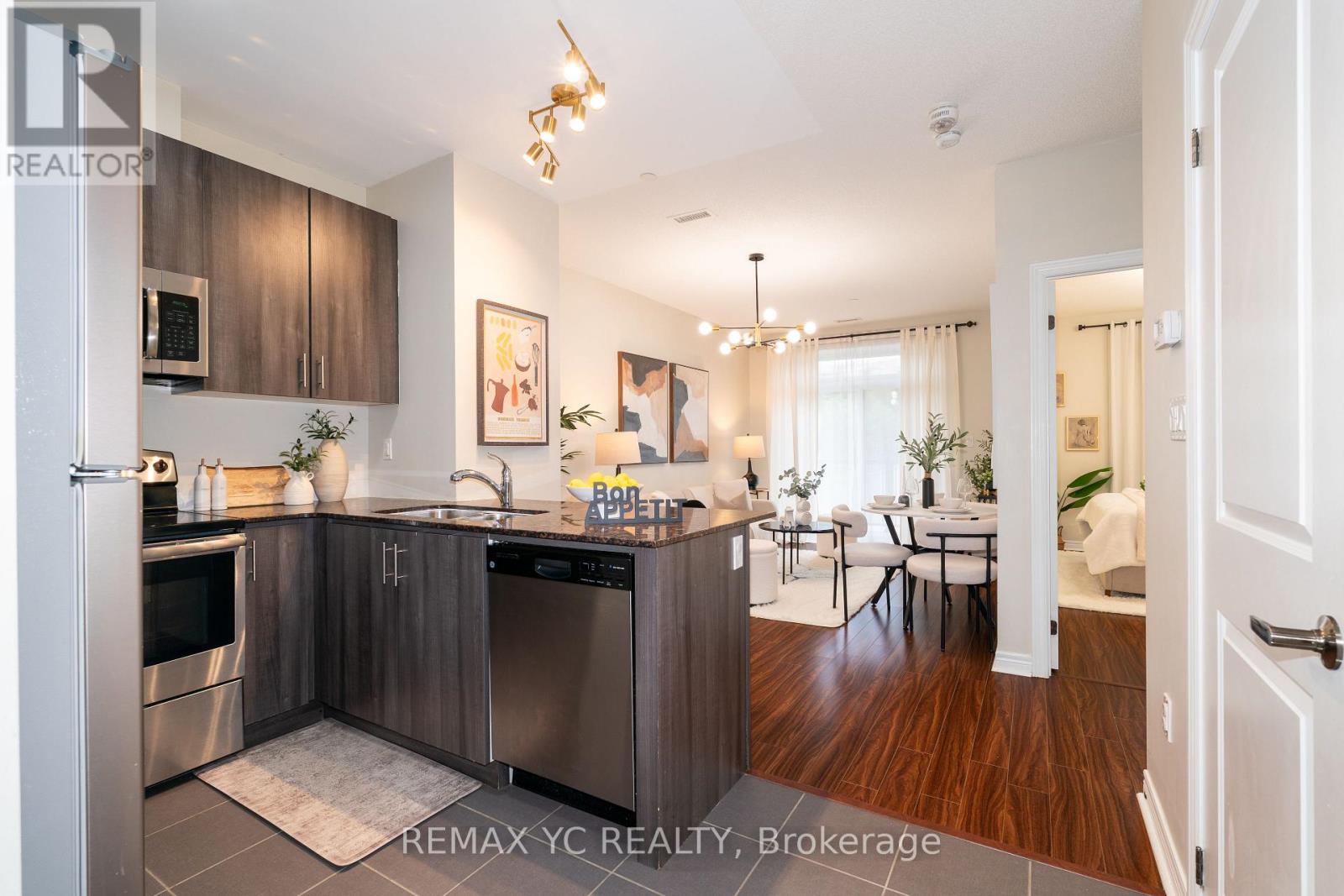 #102 7768 KENNEDY ROAD - 4