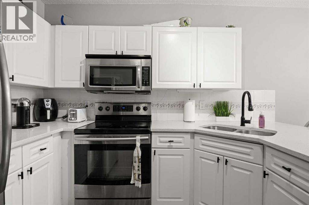 #102 1328 13 Avenue SW - 19
