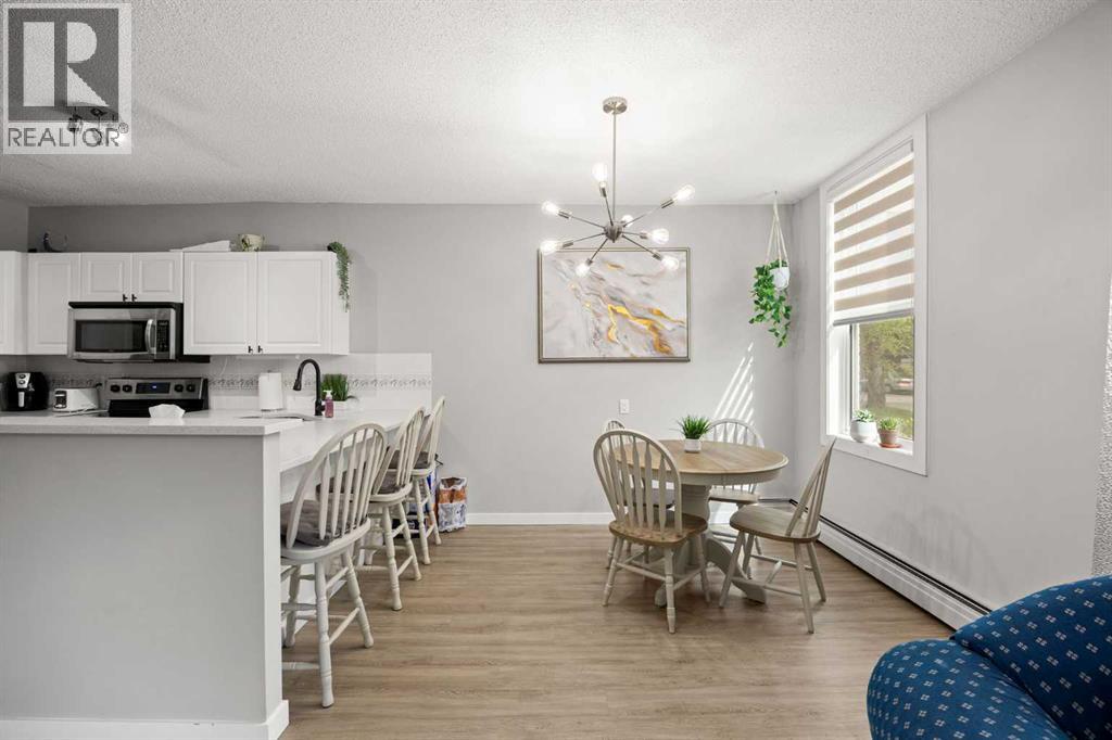 #102 1328 13 Avenue SW - 18