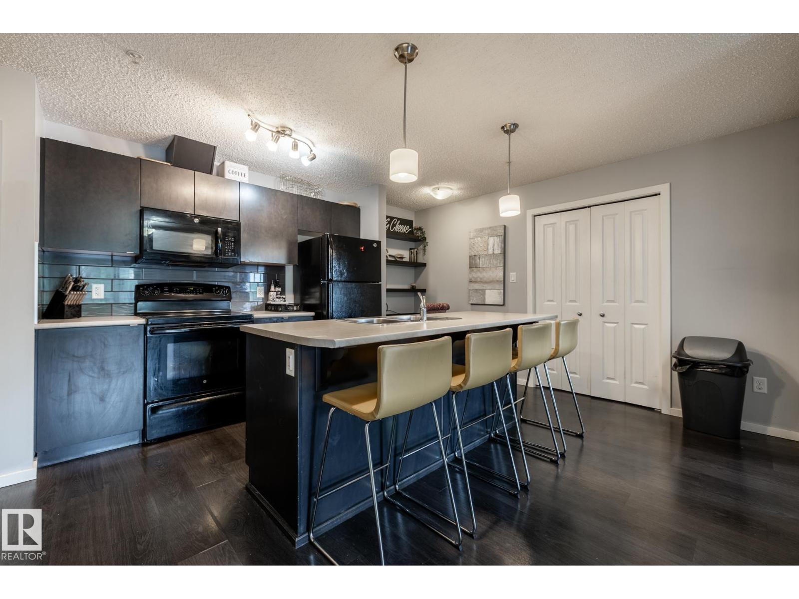 #102 508 ALBANY WY NW NW - 13