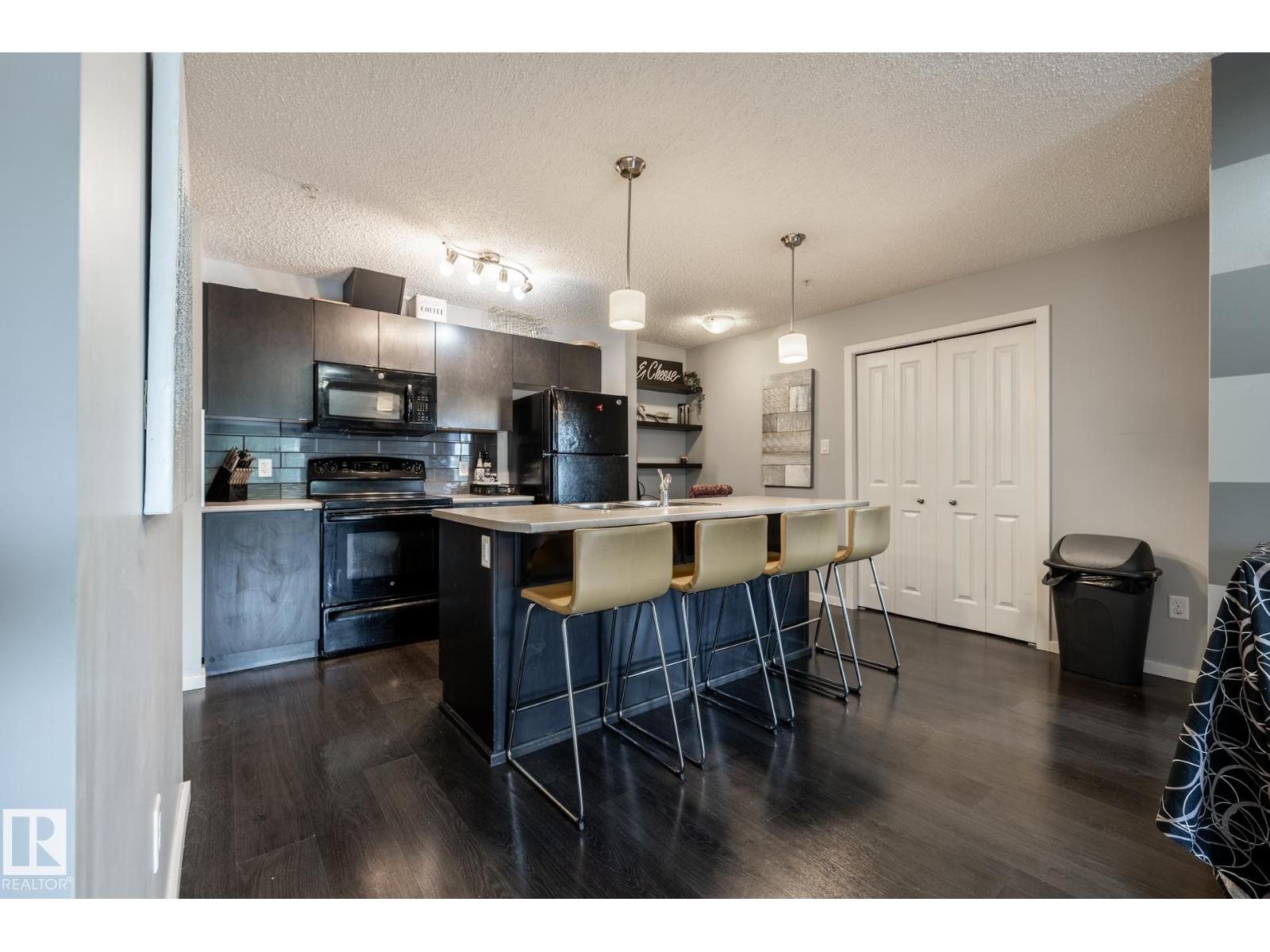 #102 508 ALBANY WY NW NW - 14