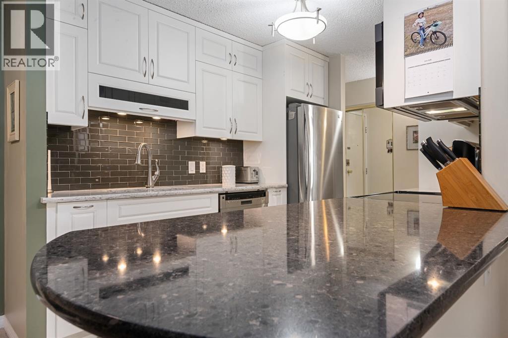 #210 111 14 Avenue SE - 12