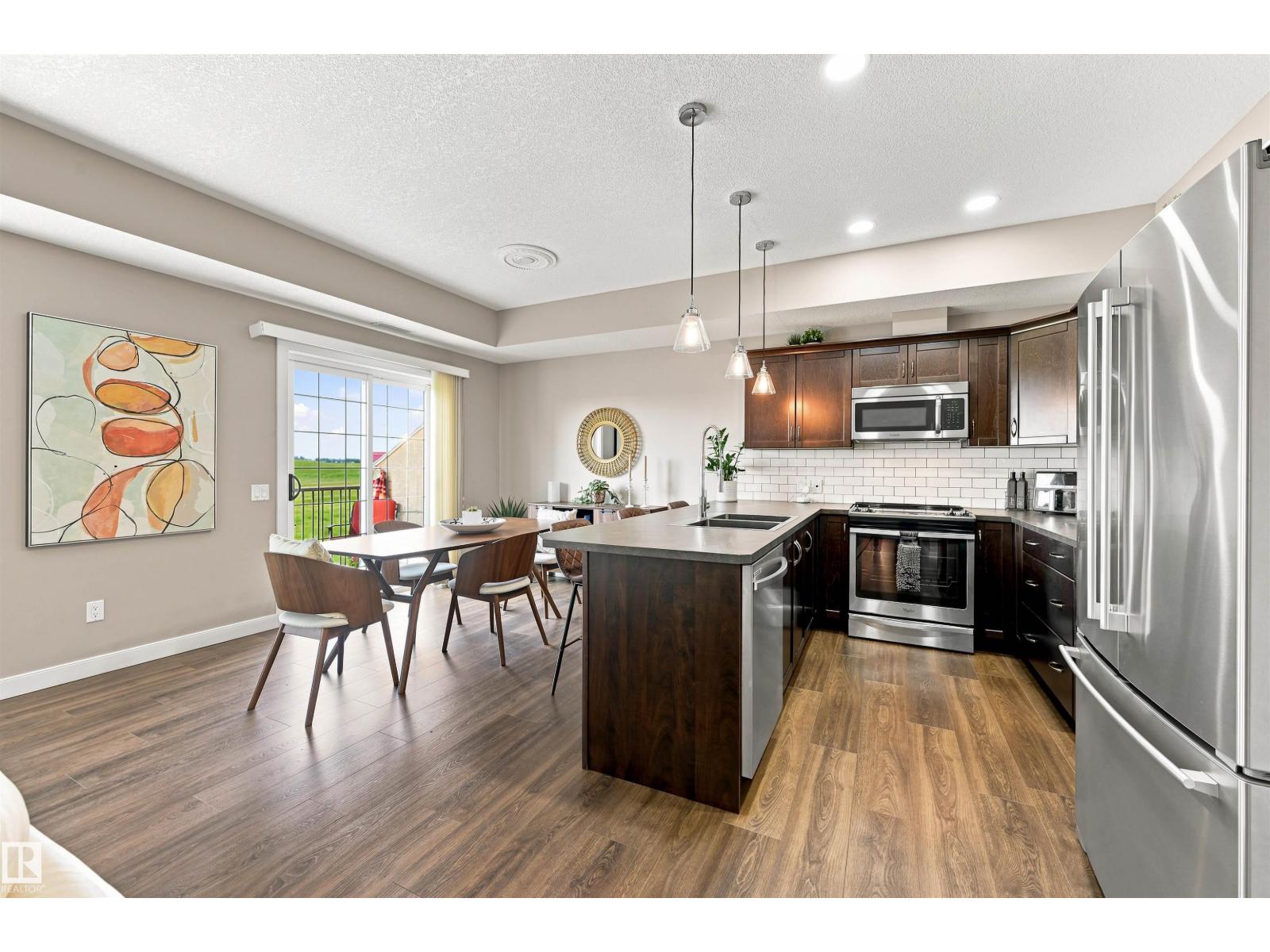 #117 7293 SOUTH TERWILLEGAR DR NW - 12