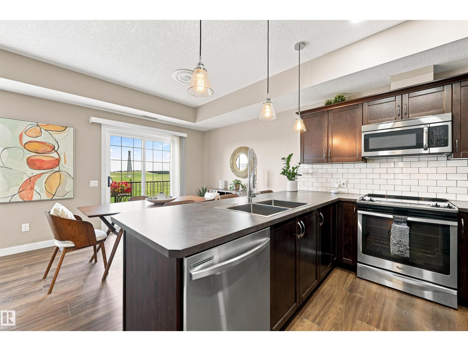 #117 7293 SOUTH TERWILLEGAR DR NW - 14