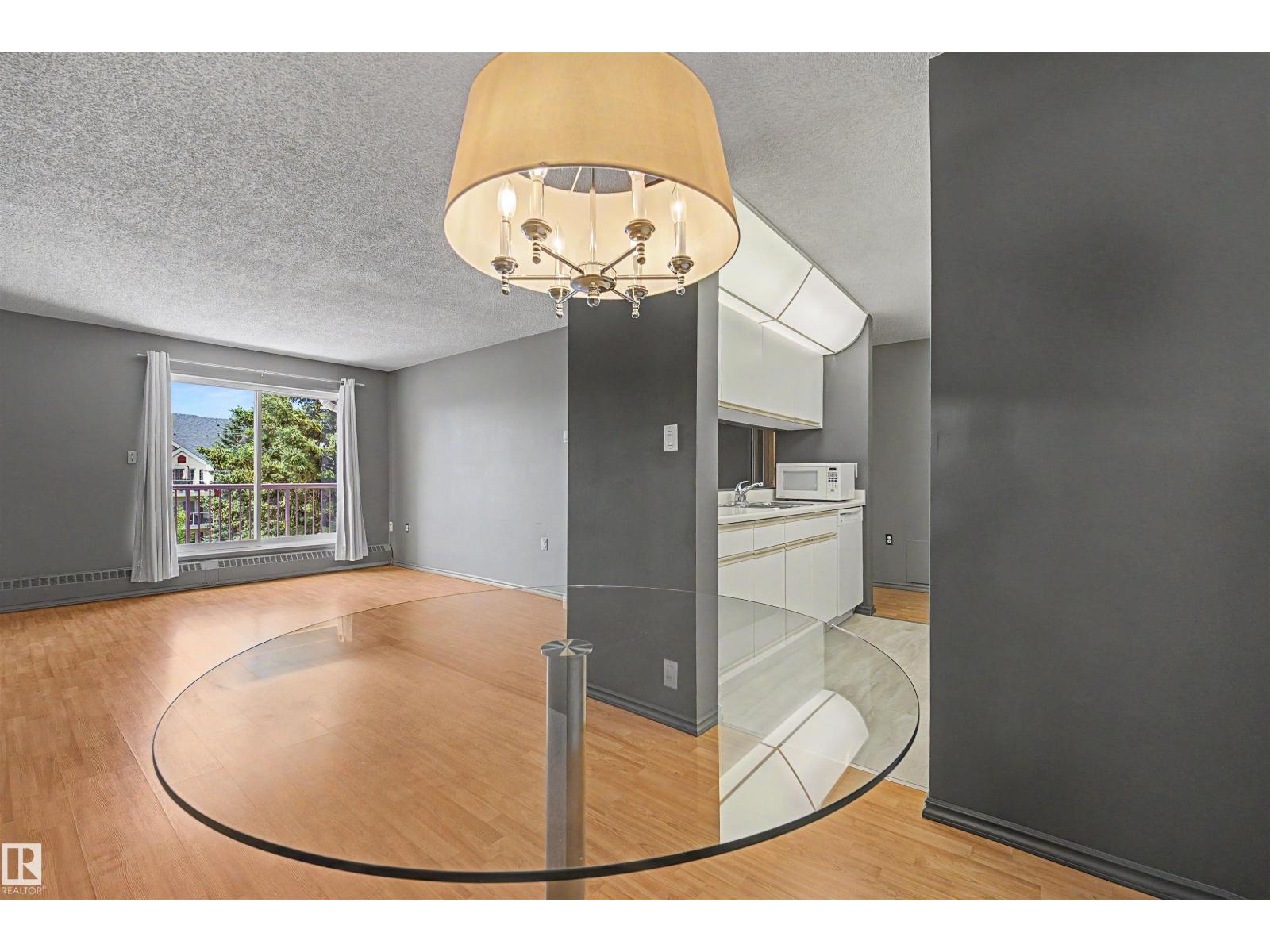 #437 10636 120 ST NW NW - 12