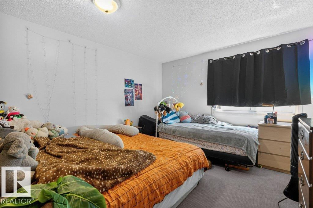 #203 10842 107 ST NW - 12