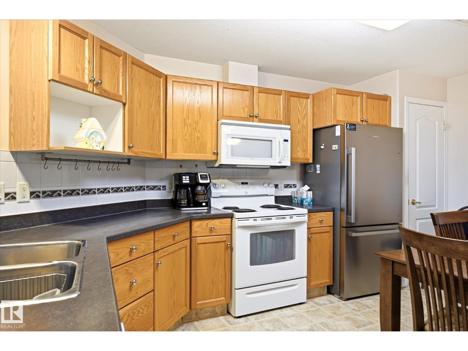 #310 237 YOUVILLE DR E NW - 7