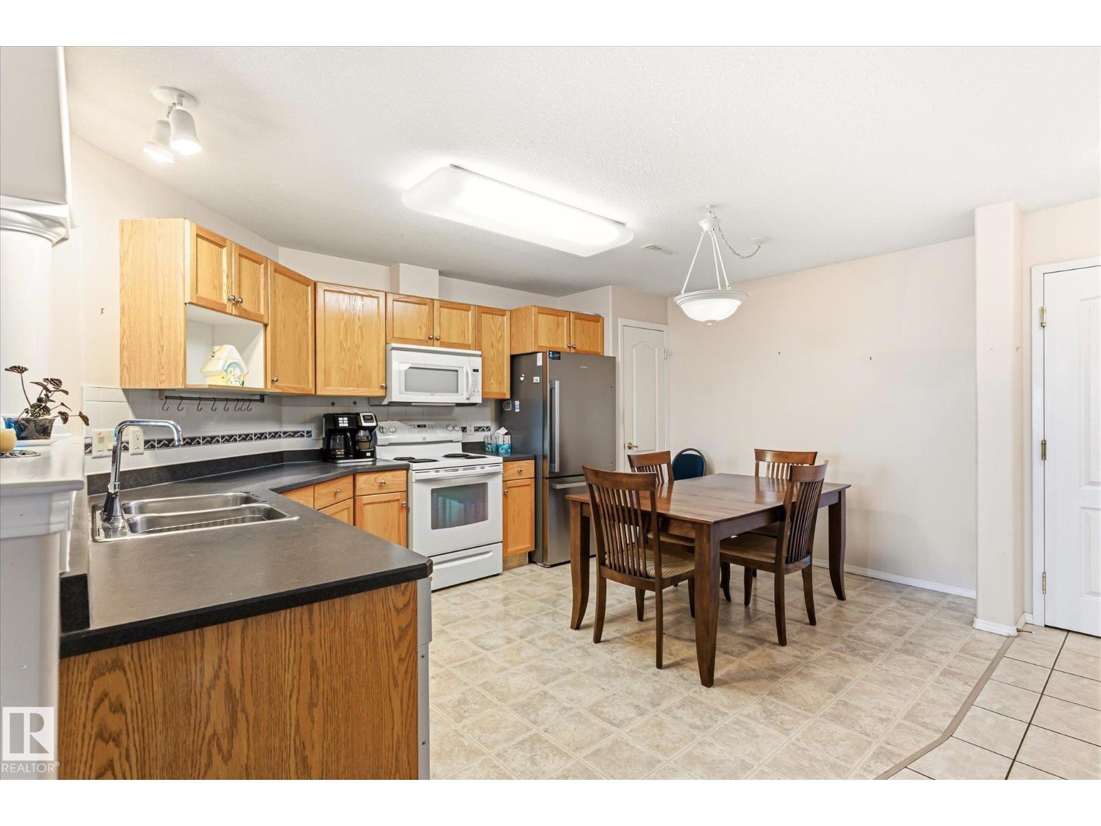 #310 237 YOUVILLE DR E NW - 6