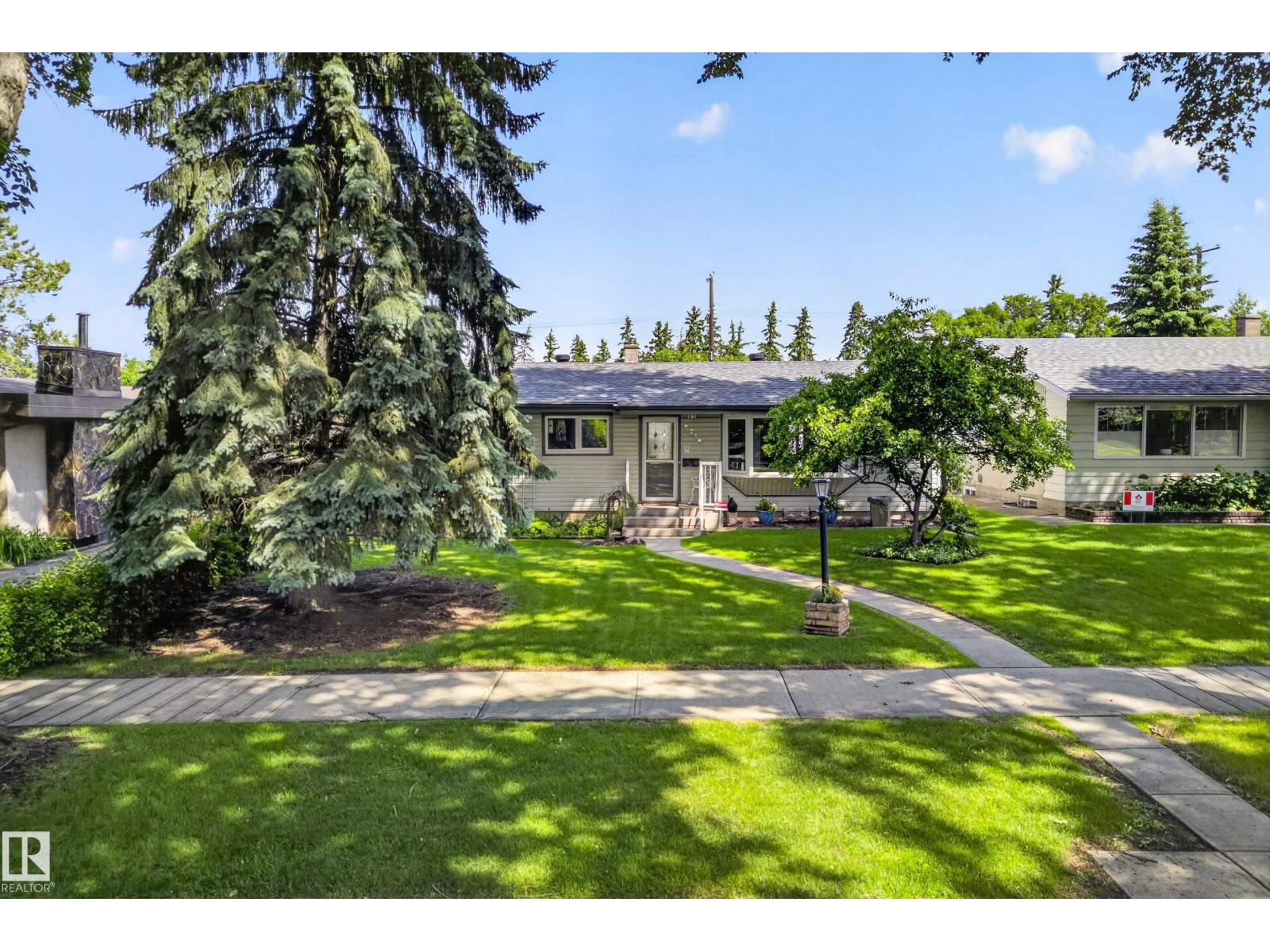 6716 101A AV NW NW - 67