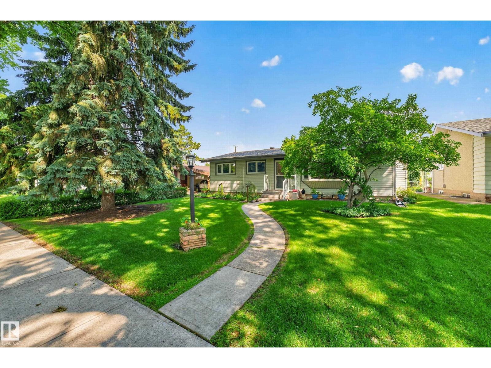 6716 101A AV NW NW - 69
