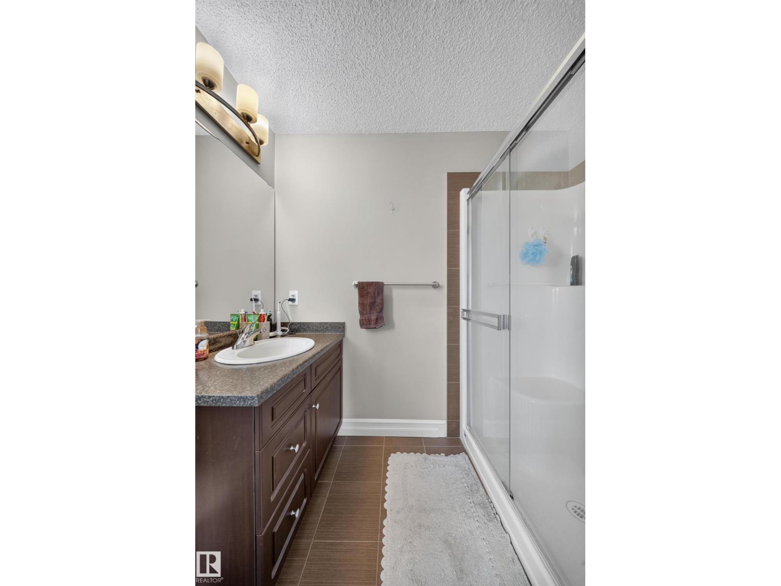 #64 655 TAMARACK RD NW - 14