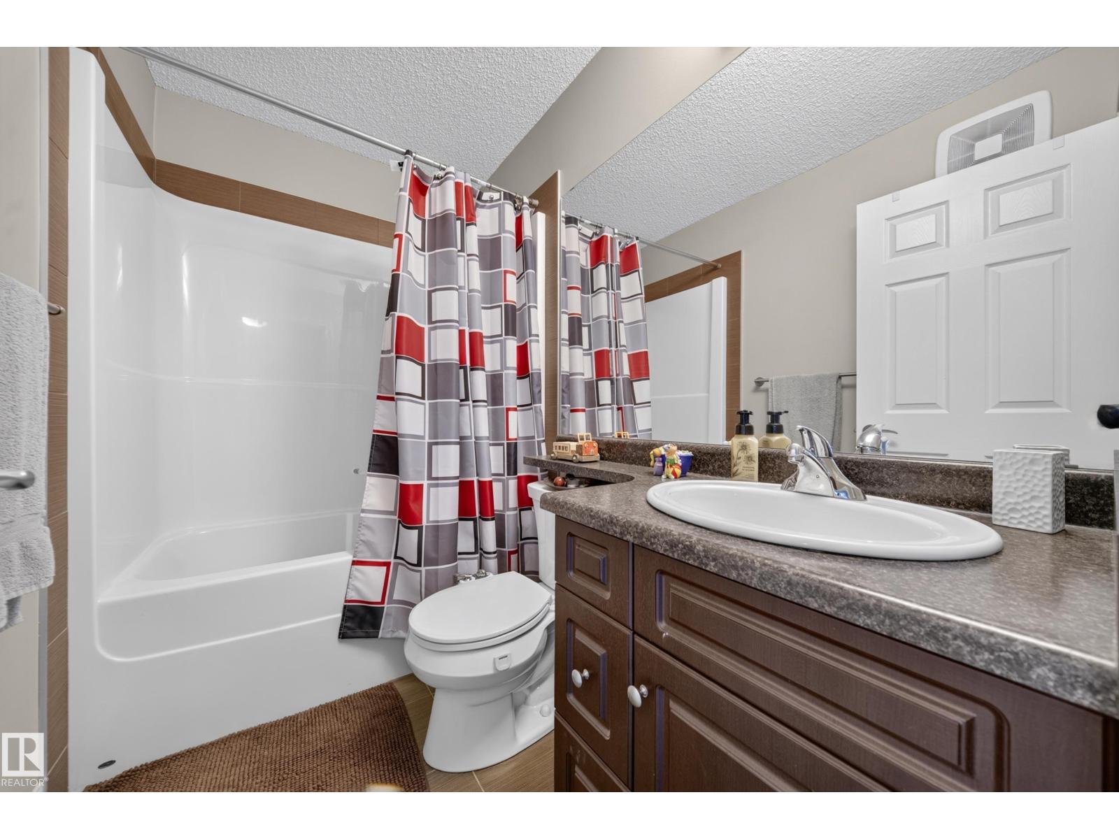 #64 655 TAMARACK RD NW - 18