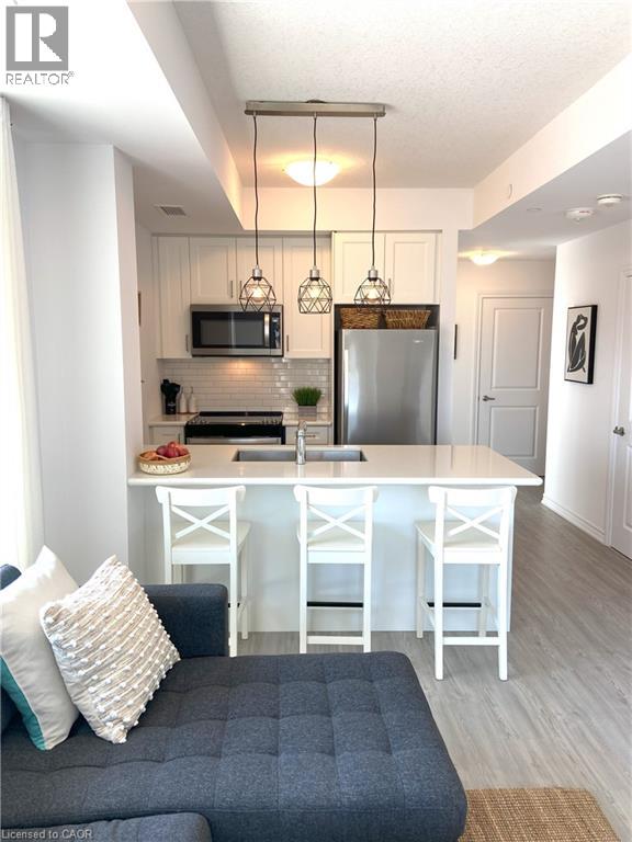#428 450 DUNDAS Street E - 3