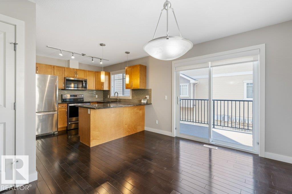 #23 7289 SOUTH TERWILLEGAR DR NW - 14