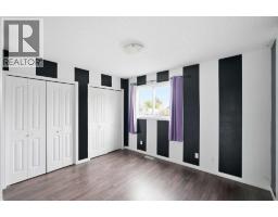 Primary Bedroom - 118 Dovertree Place Se, Calgary, AB T2B2K3 Photo 7