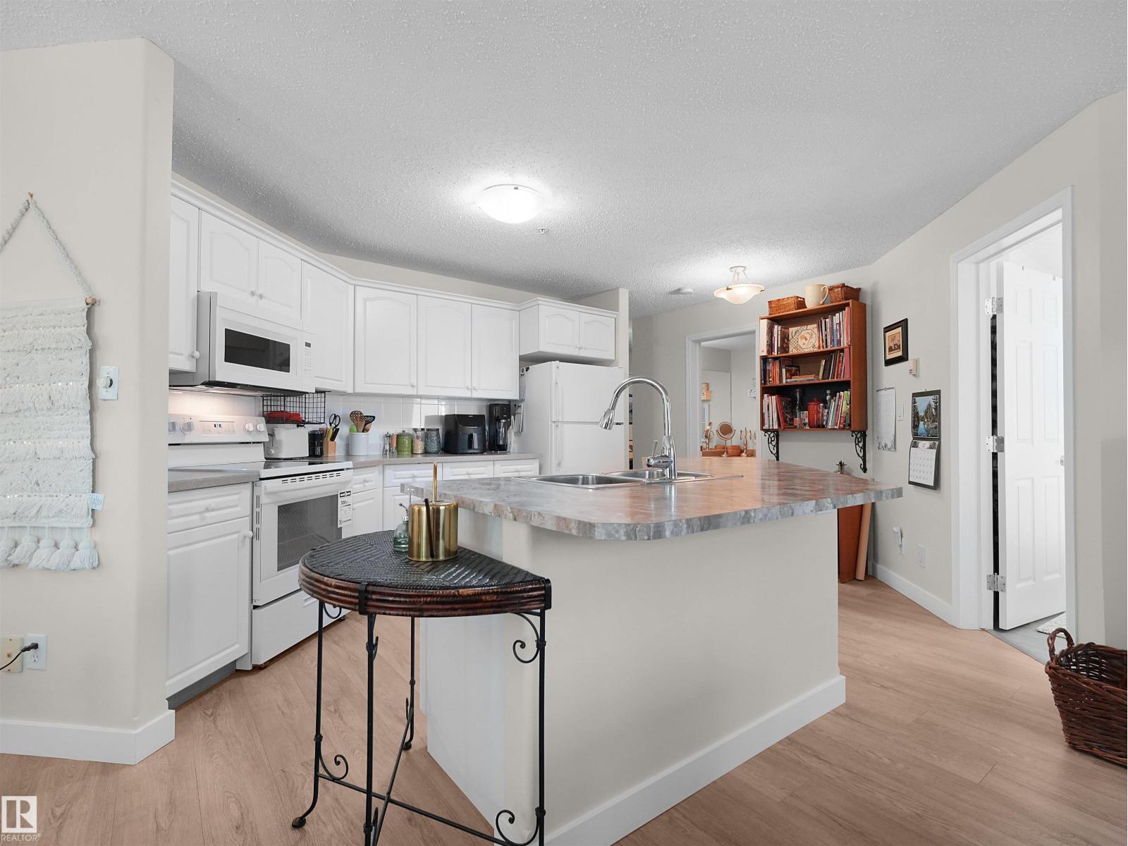 #203 9760 174 ST NW - 8