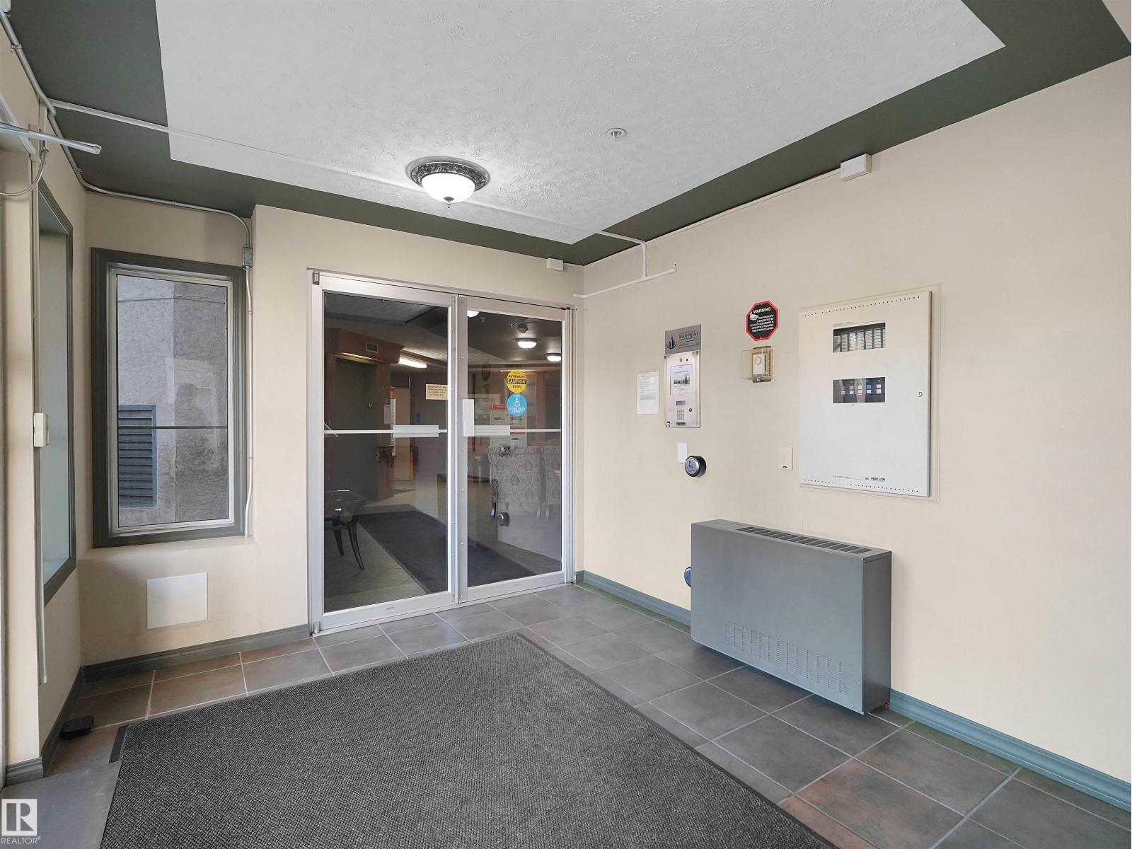 #203 9760 174 ST NW - 25