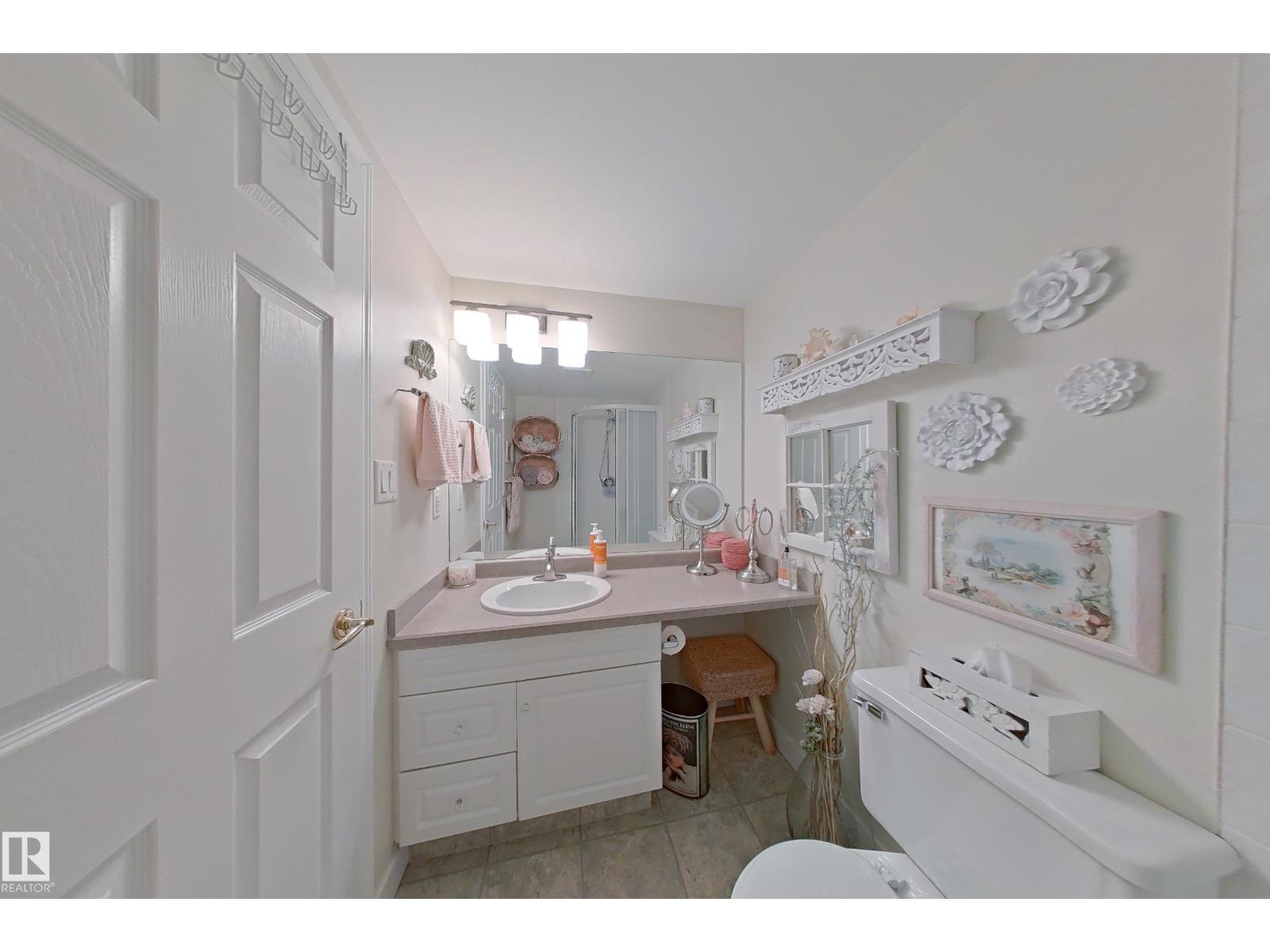 #203 9760 174 ST NW - 11