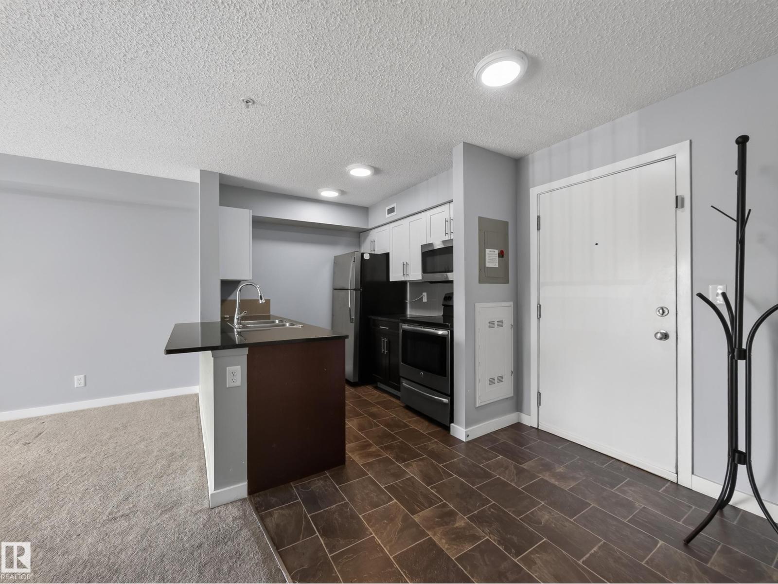 #217 12045 22 AV SW - 23