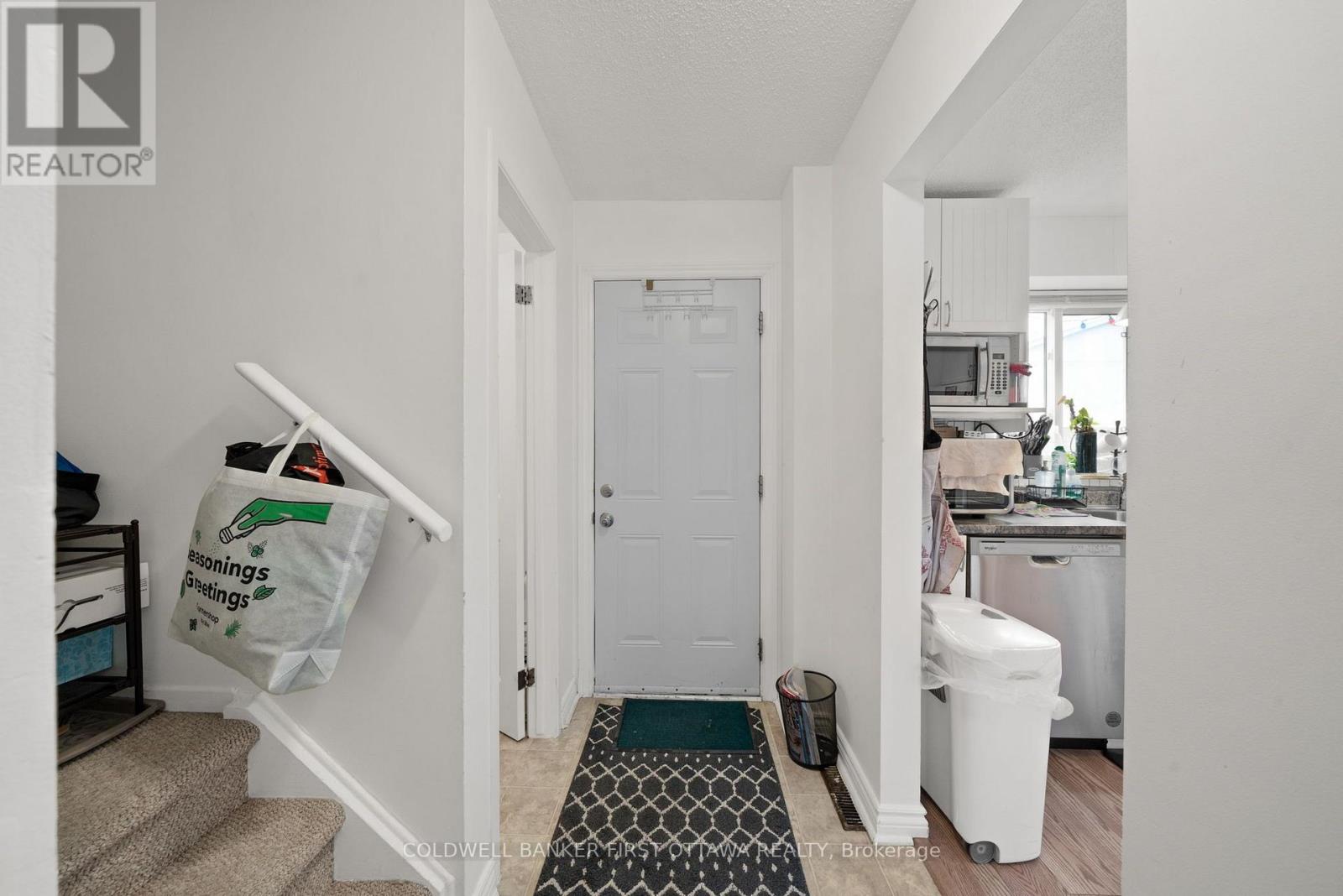 Main front foyer w 2 pc powder room.