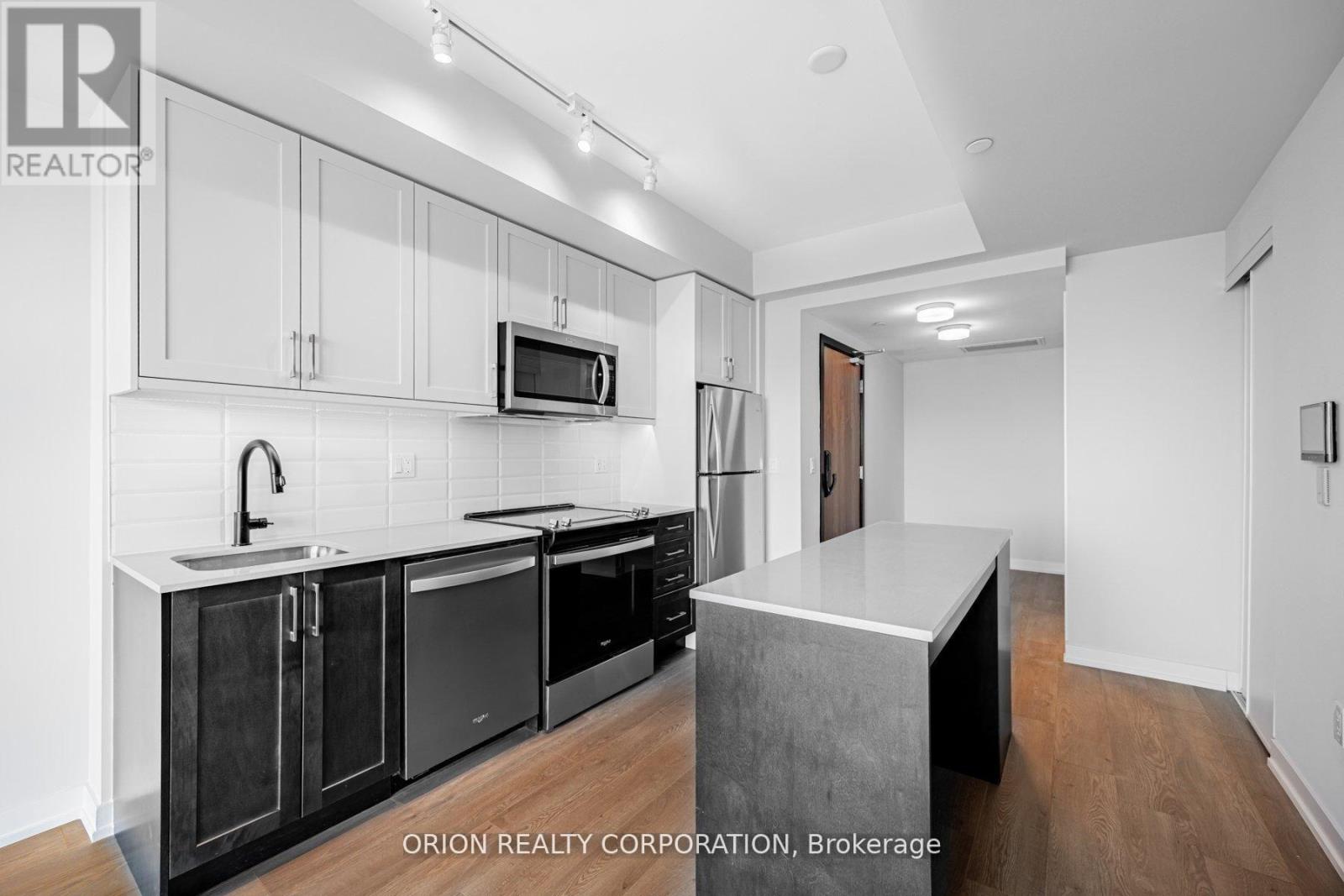 #221 201 BROCK STREET S - 1