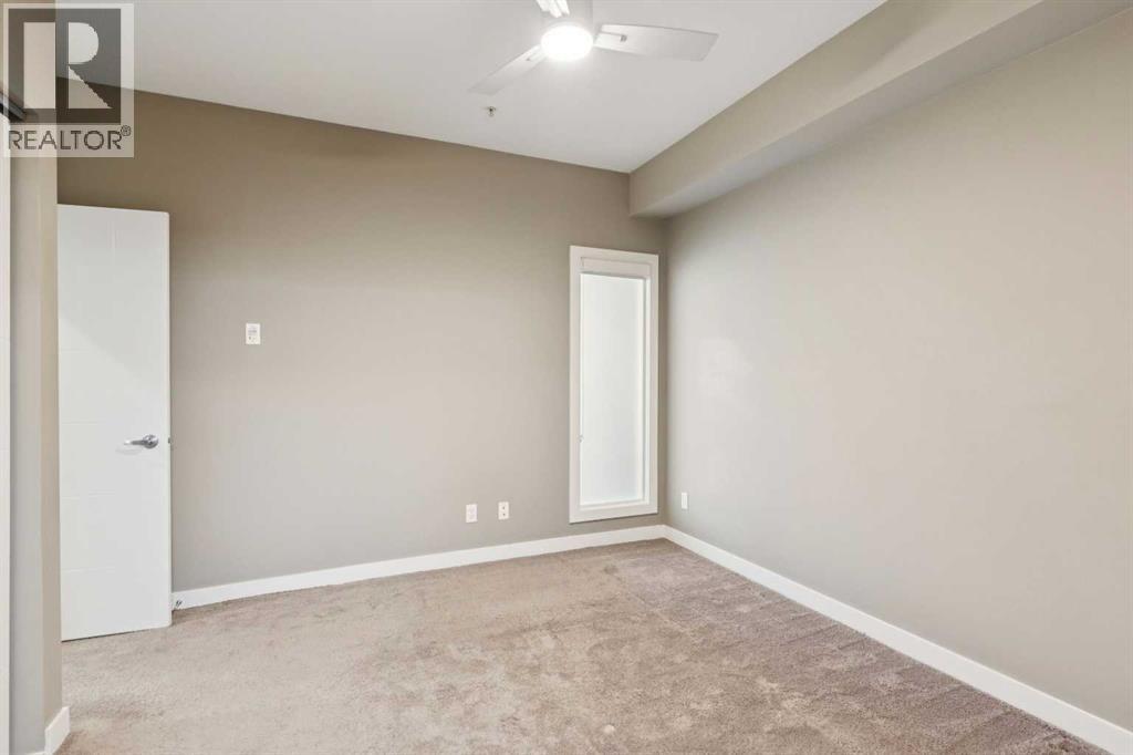 #310 93 34 Avenue SW - 18