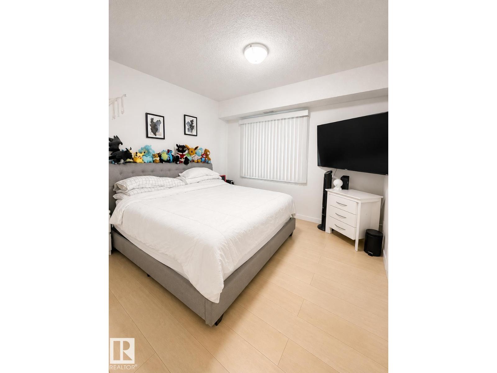 #101 11825 71 ST NW - 13