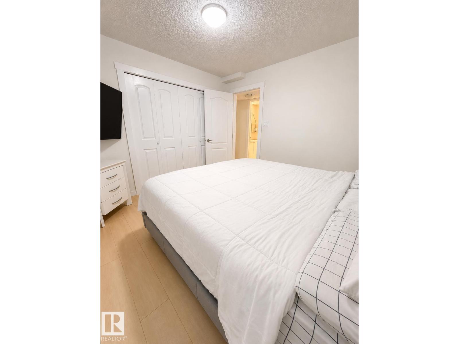 #101 11825 71 ST NW - 14