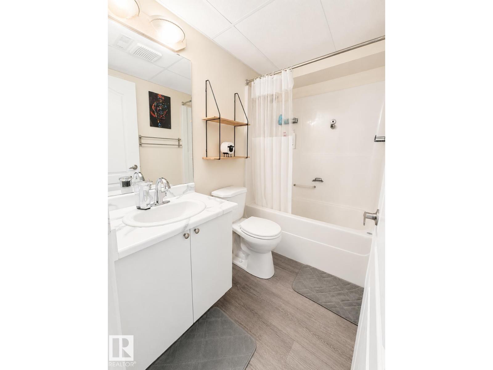 #101 11825 71 ST NW - 15